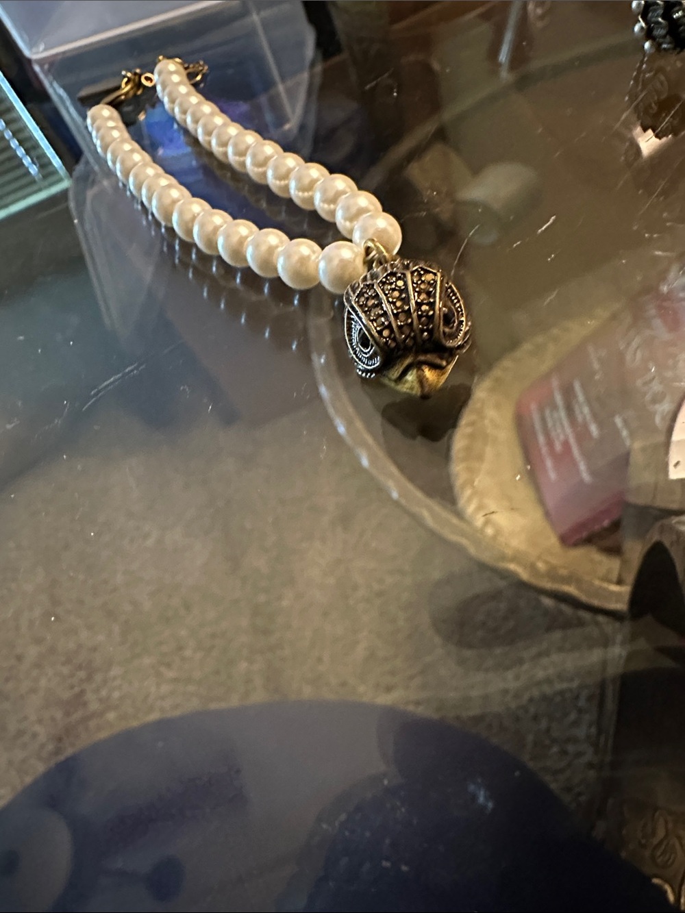 Kurt Geiger White Pearl Bracelet with Gold-Tone Crown Charm